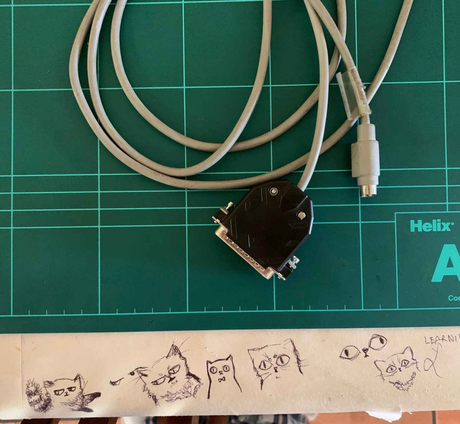 The PS/2 to DB25 serial cable my plotter came with