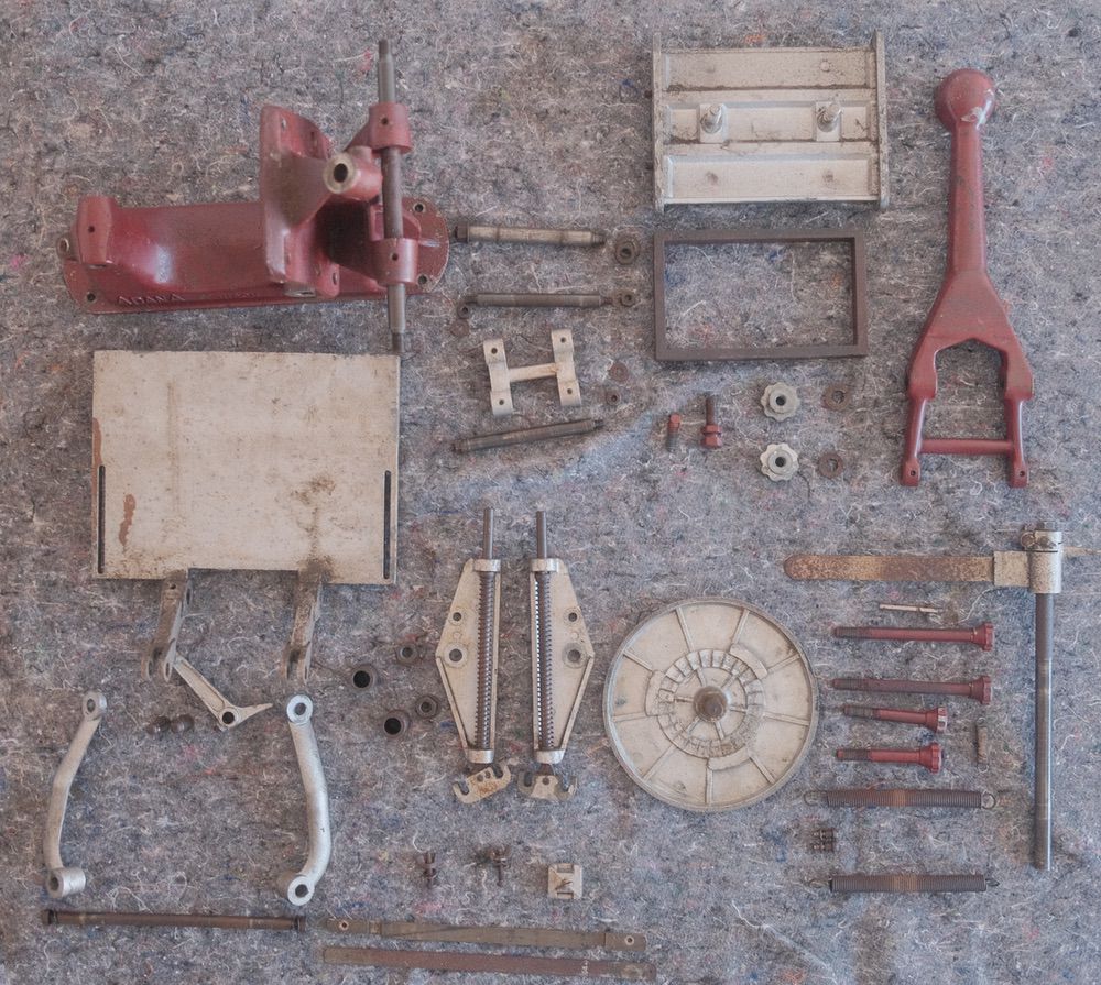 All the pieces laid out on the table before being cleaned